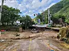 A road in Pohang, North Gyeongsang, is shown cut off on Tuesday as a road bridge was swept away due to heavy rainfall brought by Typhoon Omais overnight. [YONHAP]