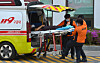 Rescue workers transfer an emergency patient.