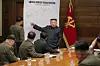 In this photo released on Tuesday by Pyongyang's state-controlled Korean Central News Agency, North Korean leader Kim Jong-un points at a blurred-out map of South Korea during a meeting of the ruling Workers' Party's Central Military Commission that took place the previous day. [NEWS1]