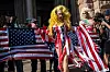A drag queen performs a routine set to the song ″Killing in the Name″ by Rage Against the Machine at the Texas State Capitol during the ″No Kings″ national rally in Austin, Texas on June 14, on the same day as President Trump's military parade in Washington, DC. Tens of thousands of protesters rallied nationwide Saturday against Donald Trump ahead of a huge military parade on the U.S. president's 79th birthday -- as the killing of a Democratic lawmaker underscored the deep divisions in American politics. ″No Kings″ demonstrators took to the streets in New York, Los Angeles, Chicago, Philadelphia, Houston, Atlanta and hundreds of other cities across the United States to condemn what they call Trump's dictatorial overreach. [AFP/YONHAP]