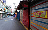 A street in Namdaemun Market in Jung District, central Seoul, is unusually empty and quiet on Tuesday. President Moon Jae-in on Monday urged the government in a meeting at the Blue House to quickly distribute the third round of emergency relief grants to small- and medium-sized business owners. [YONHAP]