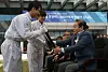 Lee Kun-hee, right, is given the first semiconductor wafer manufactured at a production line in Samsung's Nano City, one of Samsung’s main chip manufacturing bases in Gyeonggi, in September 2011. [NEWS1]
