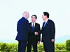 From right, Korean President Yoon Suk Yeol, Japanese Prime Minister Fumio Kishida and U.S. President Joe Biden chat at a trilateral meeting on the sidelines of the G7 Summit in Hiroshima, Japan, on May 21. [JOINT PRESS CORPS]