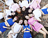 Album cover of EP 'TWICEcoaster : LANE 1' showcasing nine members of girl group Twice [JYP ENTERTAINMENT]