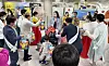 Mongolian tourists are greeted by Jeju Tourism Organization employees as they arrive at Jeju International Airport, Wednesday. About 150 tourists from Mongolia arrived in Korea through a tour package for Korea's health care services, which includes medical check-ups. [YONHAP]
