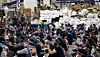 Delivery workers in Korea stage a demonstration at a logistics center in Songpa District in southern Seoul Wednesday as negotiations on improving working conditions fell through. Some 2,000 workers launched a full-fledged walkout Wednesday after 92 percent of 5,823 union members voted for the strike. [YONHAP]
