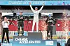 Stoffel Vandoorne, center, celebrates on the podium after winning the 2022 Formula E world champion title, alongside Mitch Evans, left, and Edoardo Mortara at the Hana Bank Seoul E-Prix in Jamsil, southern Seoul on Sunday. [YONHAP]