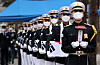 Honor guards carry caskets containing the remains of fallen soldiers during the Korean War (1950-53) to a joint funeral ceremony held at the headquarters of the 7th Army Division in Hwacheon County, Gangwon, on Thursday. This year the 2nd Army Corps excavated the remains of 68 bodies and about 8,900 articles left at the battlefields in Hwacheon and Chuncheon, Gangwon, during the war. [YONHAP]