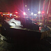 Firefighters extinguish the blaze in a Kia EV6 crash in Pyeongtaek, Gyeonggi on Monday evening. [GYEONGGI-DO FIRE SERVICES]