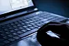 A person uses a laptop. [SHUTTERSTOCK]
