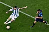 Argentina's forward Lionel Messi vies with Croatia's midfielder Mateo Kovacic during the Qatar 2022 World Cup semi-final match between Argentina and Croatia at Lusail Stadium in Lusail, north of Doha, on Tuesday. [AFP/YONHAP]