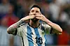 Argentina's Lionel Messi celebrates after Julian Alvarez scores their third goal during the World Cup semifinal match between Argentina and Croatia at the Lusail Stadium in Lusail, Qatar, on Tuesday. [REUTERS/YONHAP]