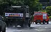 A K-10 decontamination truck sprays water on streets in Nam District, Busan, on Tuesday. [YONHAP]