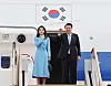 President Yoon Suk Yeol and first lady Kim Keon-hee bid farewell as they are about to depart on the presidential jet at Seoul Air Base in Gyeonggi, kicking off a weeklong state visit to the United States Monday. [YONHAP]