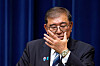 Japanese Prime Minister Shigeru Ishiba adjusts his glasses during a press conference as he announces his resignation, in Tokyo on September 7. [REUTERS/YONHAP]