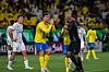 Al-Nassr's Portuguese forward Cristiano Ronaldo, center, pleads with the referee while Al Ain's Korean midfielder Park Yong-woo, left, looks on during an AFC Champions League quarterfinal game at Al -Awwal Stadium in Riyadh, Saudi Arabia on Monday. [ASIAN FOOTBALL CONFEDERATION]