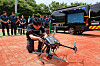 An official from the Gwanak Police Station demonstrates using a flight patrol drone for crime prevention at the Mokgolsan Trail in Gwanak District, southern Seoul, on Monday. This is the first time that drones are being used by police agencies in Seoul for crime prevention. [YONHAP]