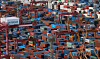 Containers are stacked at Busan Port on New Year's Day. [YONHAP]
