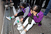 Bereaved relatives of victims of the Itaewon crowd crush shed tears in front of the Seoul Western District Court in Mapo District, western Seoul, after the local court found the ex-chief of the Seoul Metropolitan Police Agency not guilty on Thursday. [NEWS1]