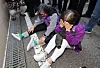 Bereaved relatives of victims of the Itaewon crowd crush shed tears in front of the Seoul Western District Court in Mapo District, western Seoul, after the local court found the ex-chief of the Seoul Metropolitan Police Agency not guilty on Thursday. [NEWS1]