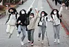Test-takers celebrate their freedom after the test as they leave Youngbok Girl's High School in Suwon on Nov. 17, 2022. [YONHAP]