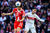 Bayern Munich’s Kim Min-jae, left, battles for the ball with Stuttgart’s Bilal El Khannous during a Bundesliga match at MHP Arena in Stuttgart, Germany, on Dec. 6. [AP/YONHAP]