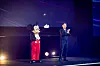 Luke Kang, president of The Walt Disney Company Asia Pacific, with Mickey Mouse at the opening ceremony of the Disney Content Showcase in Singapore. [THE WALT DISNEY COMPANY]