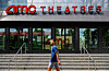 A passerby walks in front of an AMC theater in Washington on June 3. [AFP/YONHAP]