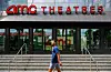 A passerby walks in front of an AMC theater in Washington on June 3. [AFP/YONHAP]