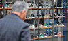 A pedestrian walks past a shoe store in the shopping district of Myeong-dong in central Seoul on April 1. [YONHAP]