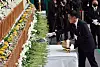 Acting President Choi Sang-mok on Monday places wreaths at a memorial altar set up in Muan Sports Complex in Muan, South Jeolla, for bereaved families of the victims of Sunday’s Jeju Air crash. [JOONGANG ILBO]