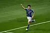 Japan's midfielder Ao Tanaka celebrates scoring his team's second goal with his teammates during the Qatar 2022 World Cup Group E football match between Japan and Spain at the Khalifa International Stadium in Doha on Thursday. [AFP/YONHAP]