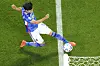 Japan's Kaoru Mitoma appears to have the ball over the line before crossing it for a goal during the World Cup group E soccer match between Japan and Spain, at the Khalifa International Stadium in Doha, Qatar, Thursday. [AP/YONHAP]