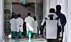 Medical personnel walk inside a general hospital in Seoul in December. [NEWS1]