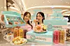 Models introduce Mochinut donuts at Sweet Park, the dessert area on the basement floor of Shinsegae Department Store's Gangnam branch in southern Seoul on Thursday. [SHINSEGAE DEPARTMENT STORE]