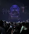 Zoey of HUNTR/X from Netflix's animated film 'KPop Demon Hunters' appears in the night sky during the “2025 Hangang Drone Light Show” at Ttukseom Hangang Park in eastern Seoul on Sept. 7. [NEWS1]