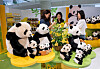 Koreans exploring panda-themed merchandise at the Everland Bao Family Pop-Up Store Season 2, at The Hyundai Seoul in Yeongdeungpo District, western Seoul. [YONHAP]