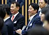 Presidential chief of staff Kang Hoon-sik, right, and Korea Exchange CEO Jeong Eun-bo listen to President Lee Jae-myung during a meeting on eradicating unfair trading practices in the stock market at Korea Exchange's office in Yeouido, western Seoul, on June 11. [JOINT PRESS CORPS]