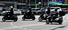 Delivery riders on a street in Seoul on Tuesday. [NEWS1]