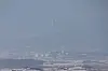 A North Korean flag flutters in Kijong-dong village inside the demilitarized zone (DMZ), as seen from the Odusan Unification Observatory in Paju, Gyeonggi, on Jan. 7. [YONHAP]