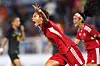 Sarina Bolden of the Philippines, left, celebrates after scoring against Malaysia at the 32nd Southeast Asian Games in Phnom Penh, Vietnam on May 6. [AFP/YONHAP]