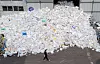 Styrofoam boxes used as packaging for delivered products are stacked at a waste processing company in Seoul on Thursday. Ahead of Korea's Chuseok holiday, more boxes are expected to pile up as people send gifts to each other. [YONHAP]