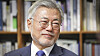 Former President Moon Jae-in smiles as he talks with the leadership of the Democratic Party at his home in Pyeongsan Village in Yangsan, South Gyeongsang on Jan. 2. [NEWS1]