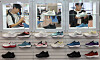 Visitors view slip-on sneakers at the 2024 Busan International Footwear, Textile and Fashion Exhibition at the Bexco convention center in Busan on Thursday. [YONHAP]