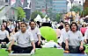 Participants practice yoga during an event celebrating the 10th International Day of Yoga at COEX Plaza in Gangnam District, southern Seoul, on Saturday. [EMBASSY OF INDIA]