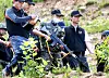 Lim Do-bin, an army sergeant who killed five soldiers and wounded seven others in a shooting spree, reenacts his actions with police in 2014. [JOINT PRESS CORPS]