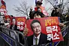 Supporters of impeached President Yoon Suk Yeol attend a rally to oppose his impeachment outside of a detention center in Uiwang, Gyeonggi on March 7 as a court rules that his arrest should be overturned. [AP/YONHAP]