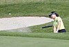 Ryu So-yeon hits her bunker shot on the 18th hole during the final round of the 34th KIA Motors Korea Women's Open at the Bear's Best CheongNa Golf Club in Incheon on Sunday. [YONHAP]