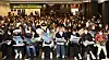 Parents read through information packets at a college admissions presentation hosted by Jongno Academy at Konkuk University Alumni Hall in Gwangjin District, eastern Seoul, on Nov. 19, 2021. [JANG JIN-YOUNG]