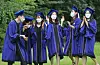 New graduates of Seoul National University pose for photos at Gwanak Campus on Aug. 27, 2021. [YONHAP]